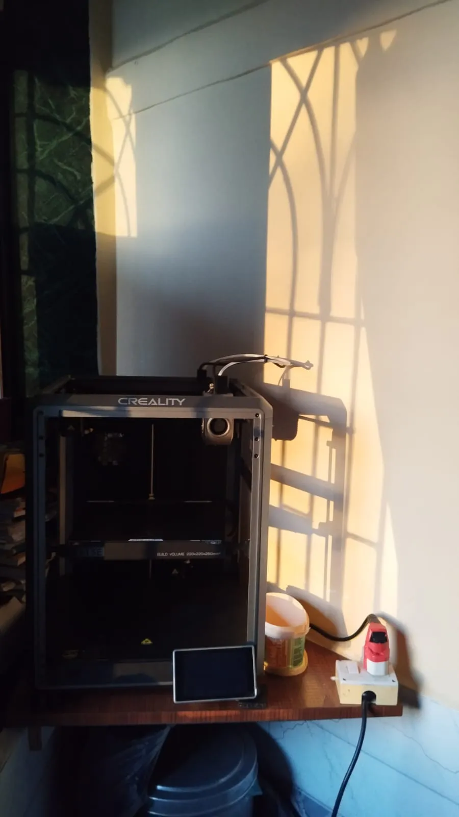 Prixie's Creality printer on a desk by the window